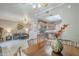 Open-concept living space offers a view of the living room and kitchen with stainless steel appliances at 3830 E Lakewood Pkwy # 1051, Phoenix, AZ 85048