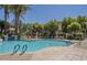 Community pool offers clear blue water and lounge seating at 3830 E Lakewood Pkwy # 1051, Phoenix, AZ 85048