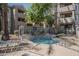 Relaxing community spa featuring privacy fence, beautiful plants and lounge seating at 3830 E Lakewood Pkwy # 1051, Phoenix, AZ 85048