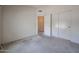 A standard bedroom with carpet and a double-door closet at 3833 W Rene Dr, Chandler, AZ 85226