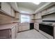 The eat-in kitchen is well lit and features ample counter and storage space at 3833 W Rene Dr, Chandler, AZ 85226