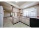 Bright eat-in kitchen with tile floors, ample counterspace and open to the living area at 3833 W Rene Dr, Chandler, AZ 85226