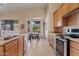 Eat-in kitchen with stainless steel appliances, and bay window at 4111 N Starry Pass Cir, Mesa, AZ 85207