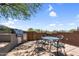 Backyard patio with built in grill and desert views at 41908 N Harbour Town Ct, Anthem, AZ 85086