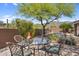 Inviting backyard with outdoor seating and a landscape view at 41908 N Harbour Town Ct, Anthem, AZ 85086