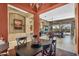 This dining room offers seamless access to the living room, making it great for entertaining at 41908 N Harbour Town Ct, Anthem, AZ 85086