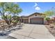 Spacious 3-car garage and well-manicured front yard offering great curb appeal to this gorgeous home at 41908 N Harbour Town Ct, Anthem, AZ 85086