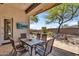 Covered patio with outdoor seating area offering a relaxing space at 41908 N Harbour Town Ct, Anthem, AZ 85086