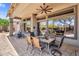 Spacious outdoor patio with seating and a beautiful view of the pool area at 41908 N Harbour Town Ct, Anthem, AZ 85086