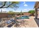 Beautiful backyard pool and spa with desert landscaping and privacy wall at 41908 N Harbour Town Ct, Anthem, AZ 85086