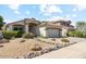 Inviting single-Gathering home with a well-manicured xeriscaped front yard and attached two-car garage at 4223 E Wildcat Dr, Cave Creek, AZ 85331