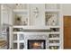 Charming fireplace with decorative shelving and a mosaic tile surround at 4223 E Wildcat Dr, Cave Creek, AZ 85331