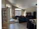 Bright living room with high ceilings, tile flooring, and stylish decor and comfortable seating at 4223 E Wildcat Dr, Cave Creek, AZ 85331