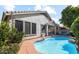 Beautiful backyard with a private pool, lush landscaping, and outdoor seating area at 4223 E Wildcat Dr, Cave Creek, AZ 85331
