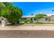 Charming single-story home with a well-manicured front yard and beautiful curb appeal at 506 W Seldon Ln, Phoenix, AZ 85021