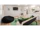 Bright living room with relaxed seating, contemporary decor, and an open kitchen view at 506 W Seldon Ln, Phoenix, AZ 85021