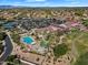 Community aerial view showcasing a resort style pool, multiple amenities and golf course for a luxurious active lifestyle at 5312 S Citrus Ct, Gilbert, AZ 85298