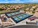 An aerial view showcases the community's well-maintained pickleball courts and provides a great recreational amenity for residents at 5312 S Citrus Ct, Gilbert, AZ 85298