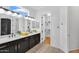 Bathroom features double sinks, black hardware, and large walk-in closet at 5312 S Citrus Ct, Gilbert, AZ 85298