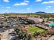 An aerial view shows the community center with a putting green and parking area at 5312 S Citrus Ct, Gilbert, AZ 85298