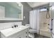 Bright bathroom features modern sink and mirror, with tile shower at 5601 W Whitten St, Chandler, AZ 85226