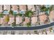 Aerial neighborhood view of the property shows mature landscaping, pools, and nearby streets at 630 W Navarro Ave, Mesa, AZ 85210