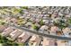 Aerial view of the residential neighborhood and its proximity to roads, schools, and green spaces at 630 W Navarro Ave, Mesa, AZ 85210