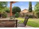 Cozy backyard patio provides a private outdoor space with manicured greenery, perfect for relaxing at 630 W Navarro Ave, Mesa, AZ 85210