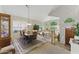 Open dining area with wood table, natural light, and views into the living room at 630 W Navarro Ave, Mesa, AZ 85210