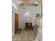 Inviting entryway features wood floors, a high ceiling, and charming decor at 630 W Navarro Ave, Mesa, AZ 85210