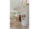 Bright foyer features a wood front door, tile flooring, and an open staircase at 630 W Navarro Ave, Mesa, AZ 85210
