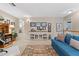 Comfortable loft featuring an office area, decor, and a blue couch at 630 W Navarro Ave, Mesa, AZ 85210
