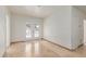 Bright room with neutral colors, tile floor, shuttered doors, and a closet at 6550 N 7Th St, Phoenix, AZ 85014