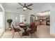 Charming dining area with modern lighting fixture and views of the adjacent updated kitchen at 6550 N 7Th St, Phoenix, AZ 85014