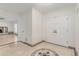 Bright foyer with decorative tile design and double-door entry at 6550 N 7Th St, Phoenix, AZ 85014
