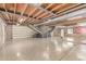 Large garage with stairs and polished flooring at 6550 N 7Th St, Phoenix, AZ 85014