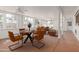 Open living area with a seating area, dining space, and an abundance of natural light at 6550 N 7Th St, Phoenix, AZ 85014