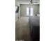 Spacious bedroom offering soft carpet, natural light, and patio access at 696 W Shawnee Dr, Chandler, AZ 85225