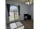 Bright bedroom with a large window, wood floors, ceiling fan, and ample natural light at 696 W Shawnee Dr, Chandler, AZ 85225