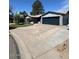 Charming single-story home featuring a well-maintained front yard and attached two-car garage at 696 W Shawnee Dr, Chandler, AZ 85225