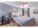 Comfortable bedroom featuring a ceiling fan and neutral decor at 8055 E Thomas Rd # C203, Scottsdale, AZ 85251