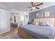 Comfortable bedroom featuring a ceiling fan and neutral decor at 8055 E Thomas Rd # C203, Scottsdale, AZ 85251
