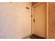 Neutral exterior door to unit C203 ensures privacy and security in a well-maintained apartment complex at 8055 E Thomas Rd # C203, Scottsdale, AZ 85251