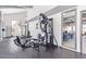 Gym featuring modern equipment and large windows for natural light at 8055 E Thomas Rd # C203, Scottsdale, AZ 85251