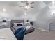 Comfortable bedroom offers ceiling fan and soft lighting in relaxing color scheme at 8055 E Thomas Rd # D111, Scottsdale, AZ 85251