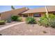 Attractive single-story house displaying xeric landscaping with cacti and gravel at 8055 E Thomas Rd # D111, Scottsdale, AZ 85251