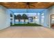 Inviting backyard patio area with pool, manicured lawn, and modern architectural design at 8308 E Mariposa Dr, Scottsdale, AZ 85251