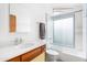 Well-lit bathroom with a classic vanity, a large mirror, and a shower-tub combination at 8308 E Mariposa Dr, Scottsdale, AZ 85251