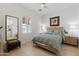 Modern bedroom with hardwood floors, large windows, and stylish furnishings at 8974 E Rusty Spur Pl, Scottsdale, AZ 85255