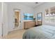Stylized bedroom with hard wood floors, backyard access, and stylish decor at 8974 E Rusty Spur Pl, Scottsdale, AZ 85255